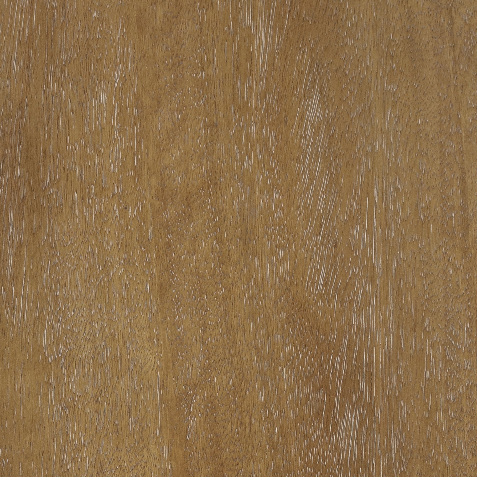 Close-up of a wooden surface with a light brown color and visible natural grain patterns running diagonally across, showing a textured and slightly glossy appearance.