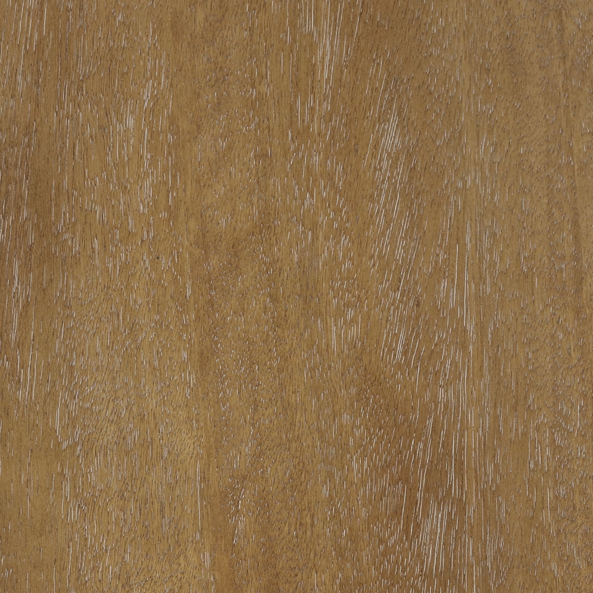 Close-up of a wooden surface with a natural brown color and visible grain patterns, showing textured lines and subtle variations in tone across the wood.