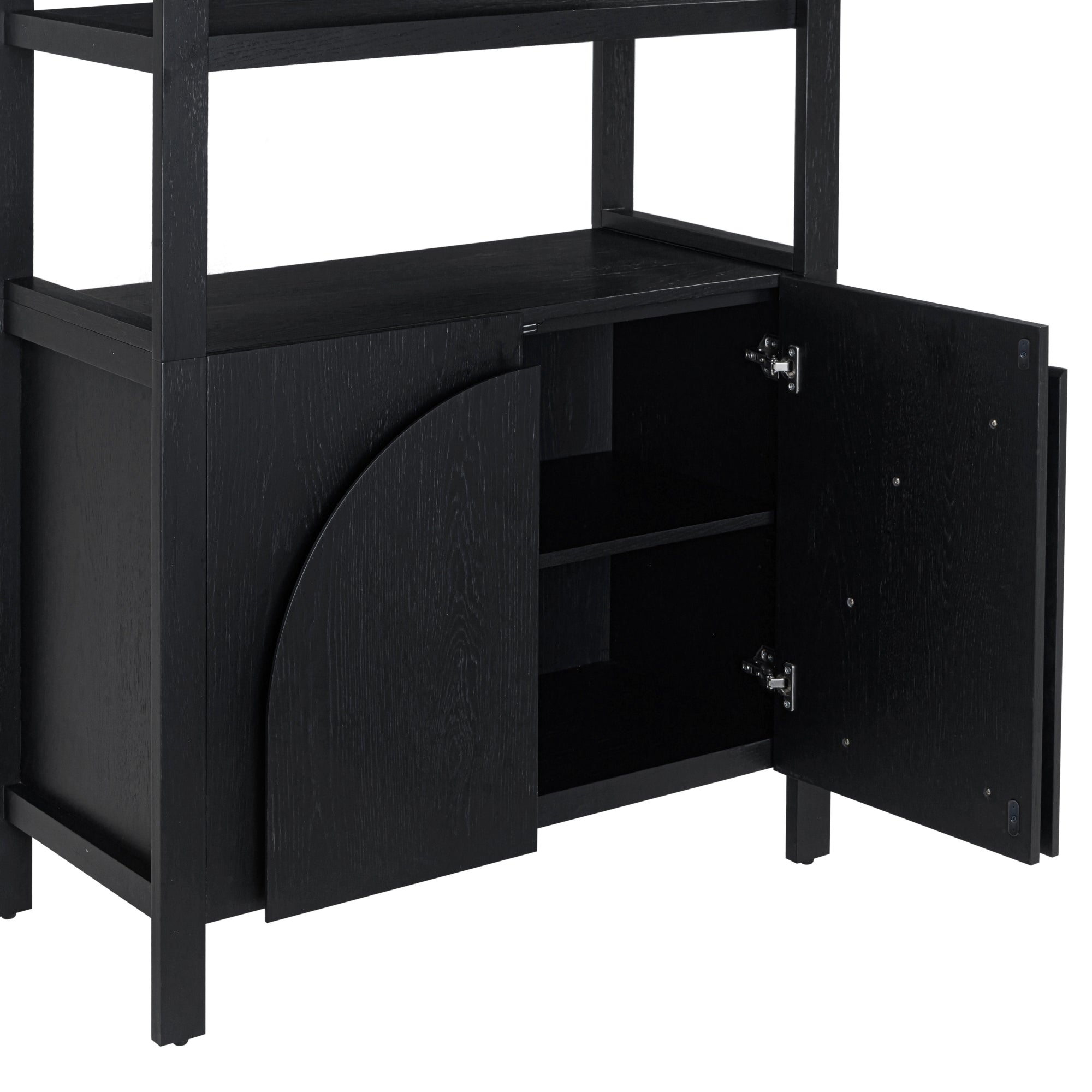 A black wooden cabinet with two doors, one open to reveal two interior shelves. The cabinet has a simple, modern design and is part of a larger shelving unit.