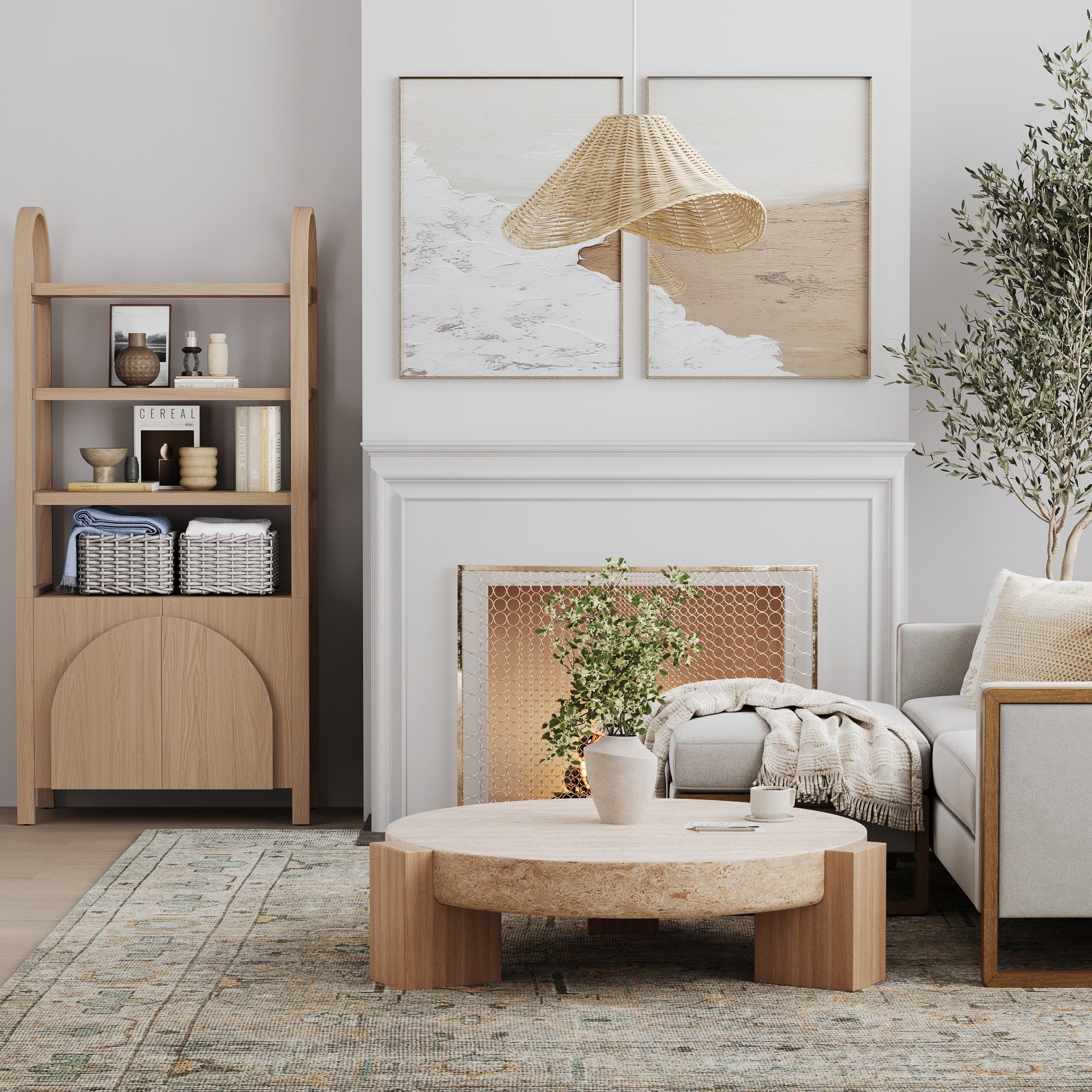 A modern living room with a light wood coffee table, gray sofa with neutral pillows and throw, a potted plant, a natural fiber pendant lamp, wall art above a white fireplace, and a wooden bookshelf with baskets and decor.