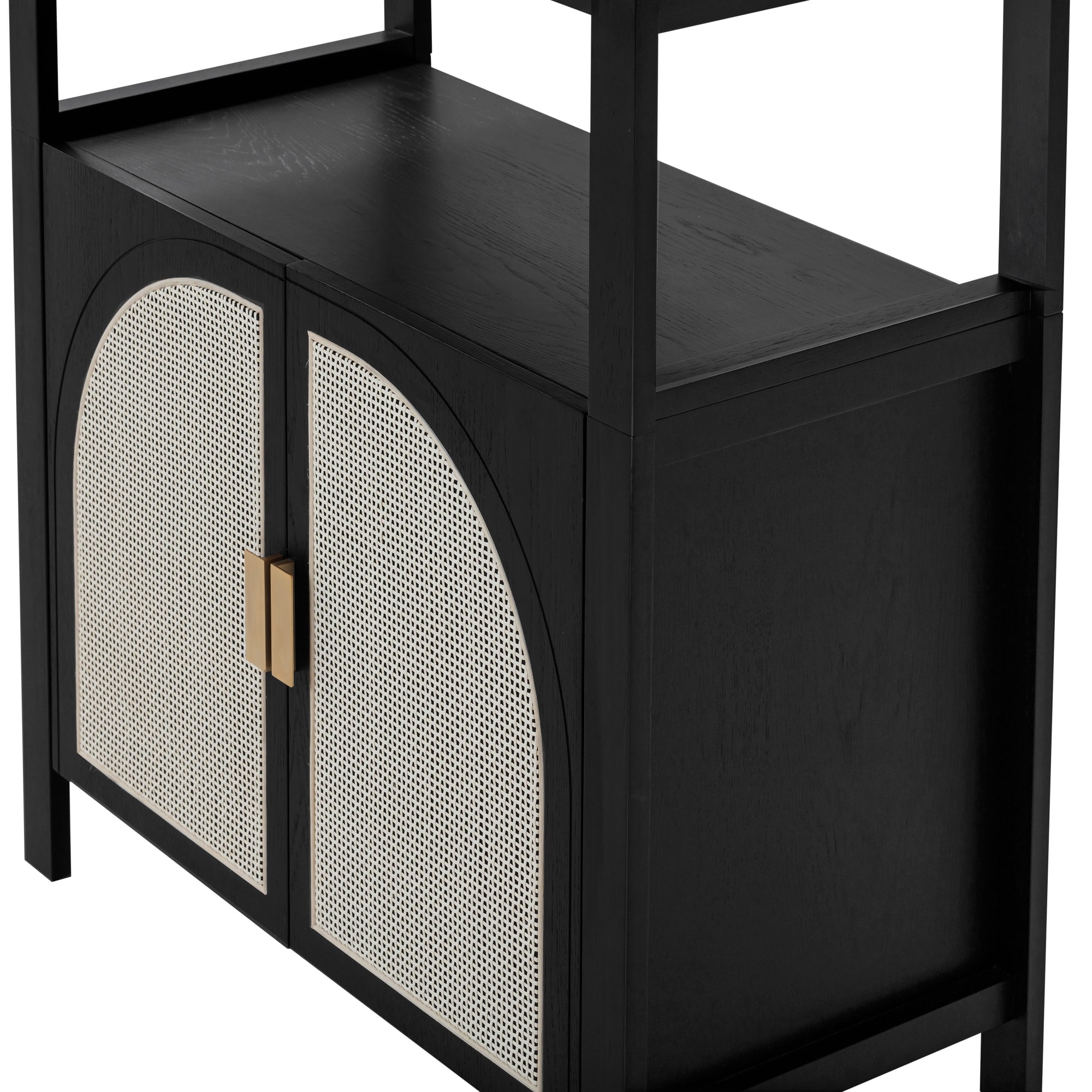 A modern black cabinet with two arched rattan doors and a gold rectangular handle, featuring open shelving above.