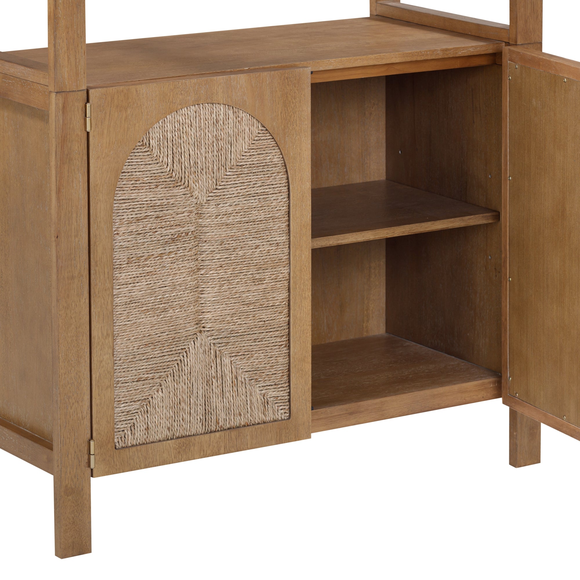 A wooden cabinet with open doors, showing two interior shelves. The left door features a decorative woven panel with an arched pattern. The finish is a light, natural wood tone.