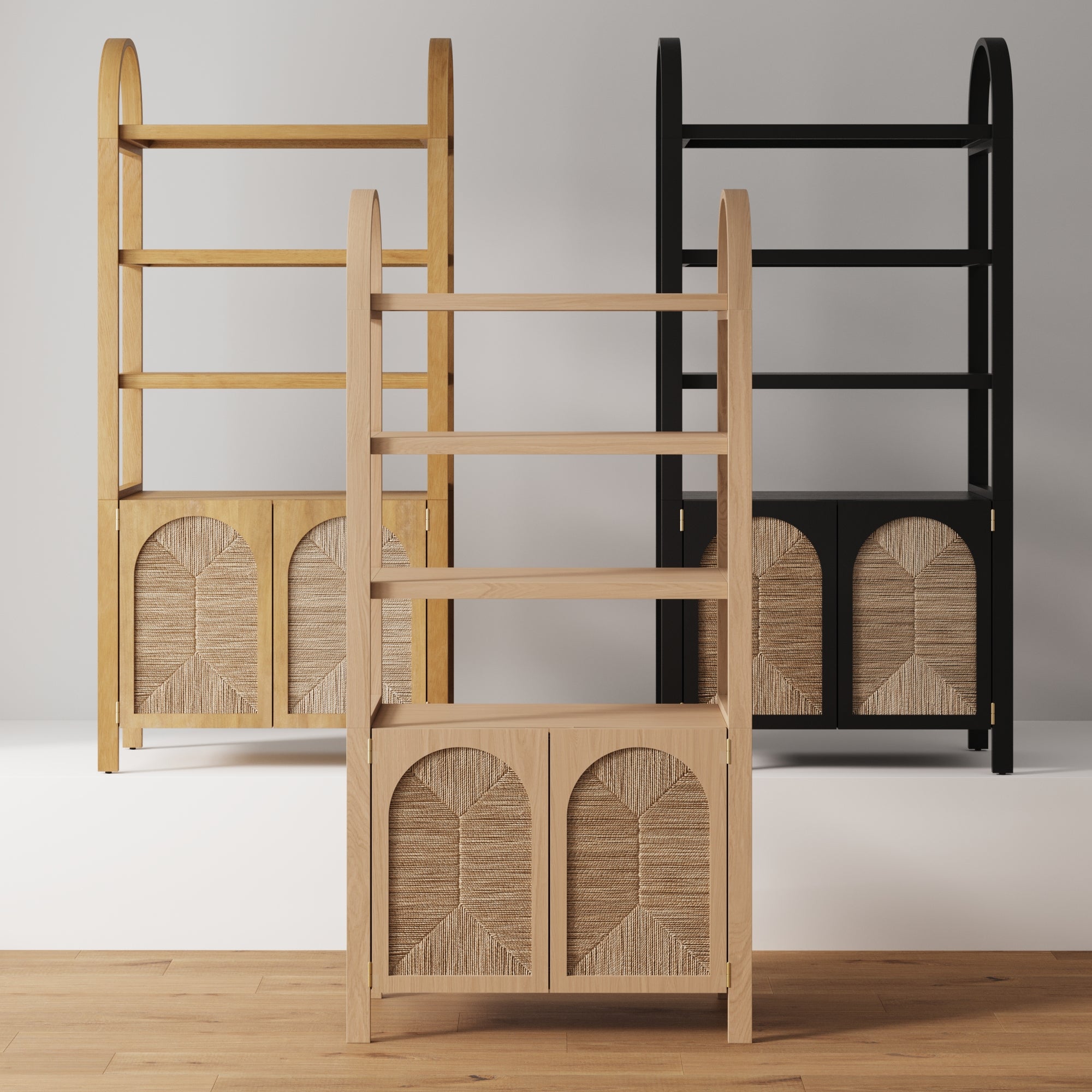 Three wooden shelving units with arched tops and woven rattan doors are displayed side by side. The units are in light wood, natural wood, and black finishes, set against a neutral background.