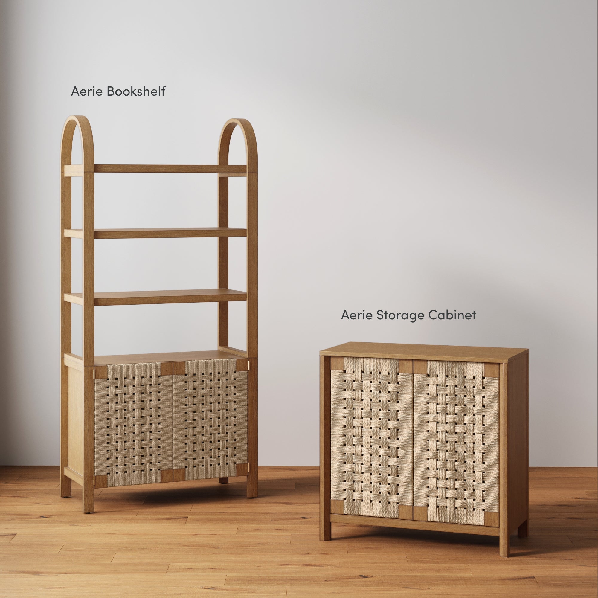 A wooden bookshelf with open shelves and woven cabinet doors stands next to a matching storage cabinet with double woven doors, both labeled Aerie Bookshelf and Aerie Storage Cabinet, on a wooden floor.
