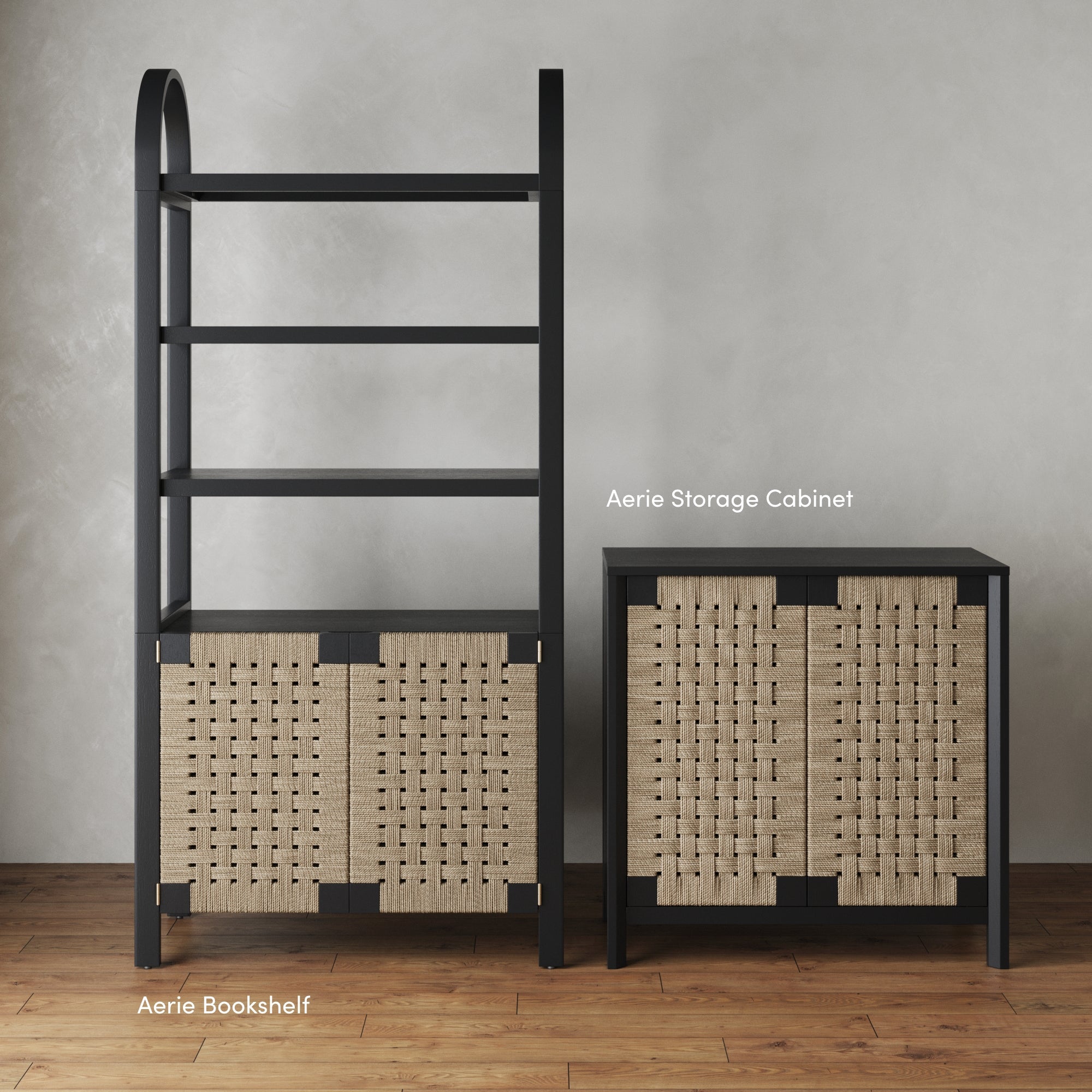 A black bookshelf and a matching storage cabinet with woven tan doors stand on a wooden floor against a plain light gray wall. Labels indicate Aerie Bookshelf and Aerie Storage Cabinet.