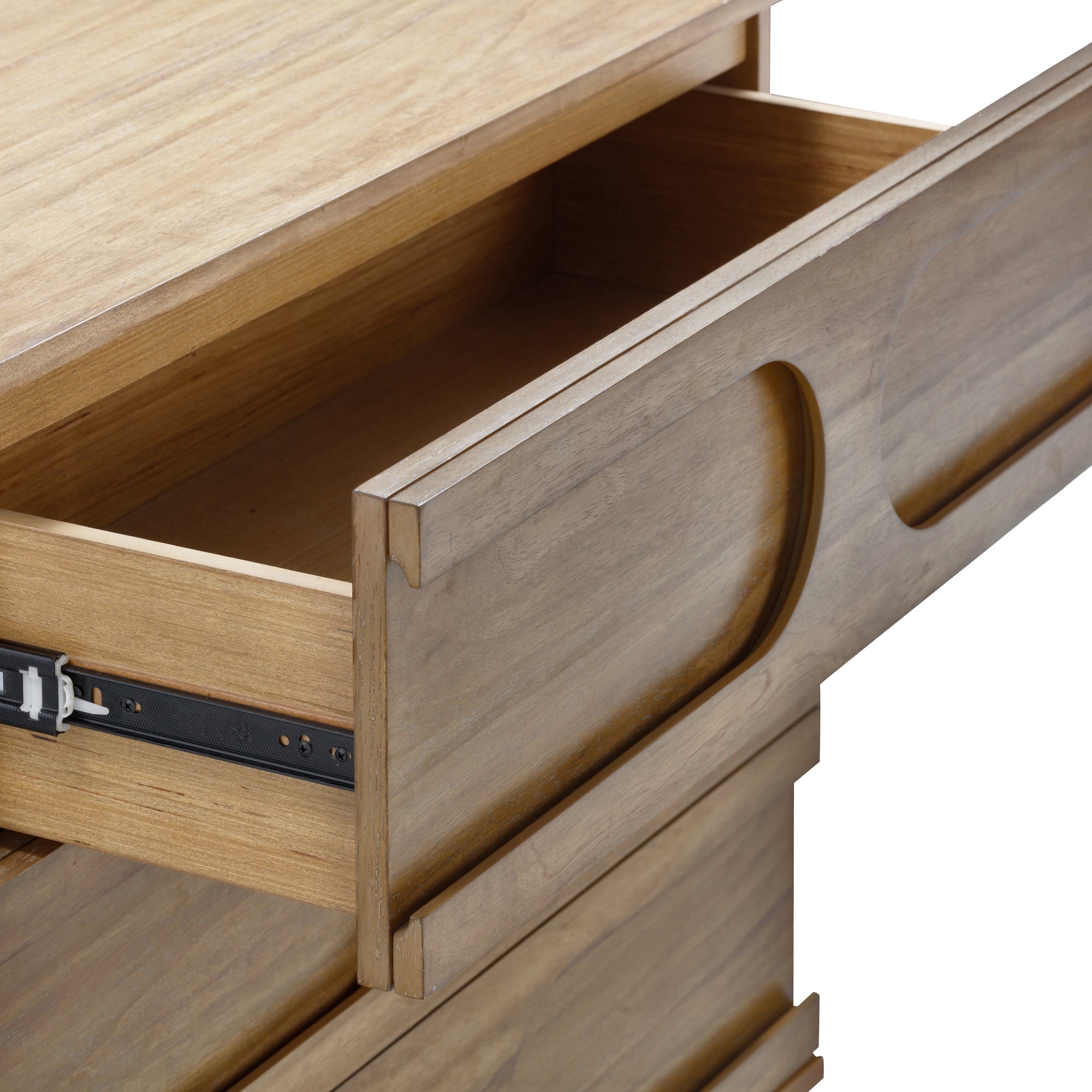 A close-up of a wooden dresser with a partially open drawer, showing a smooth, natural wood finish and a built-in groove handle.