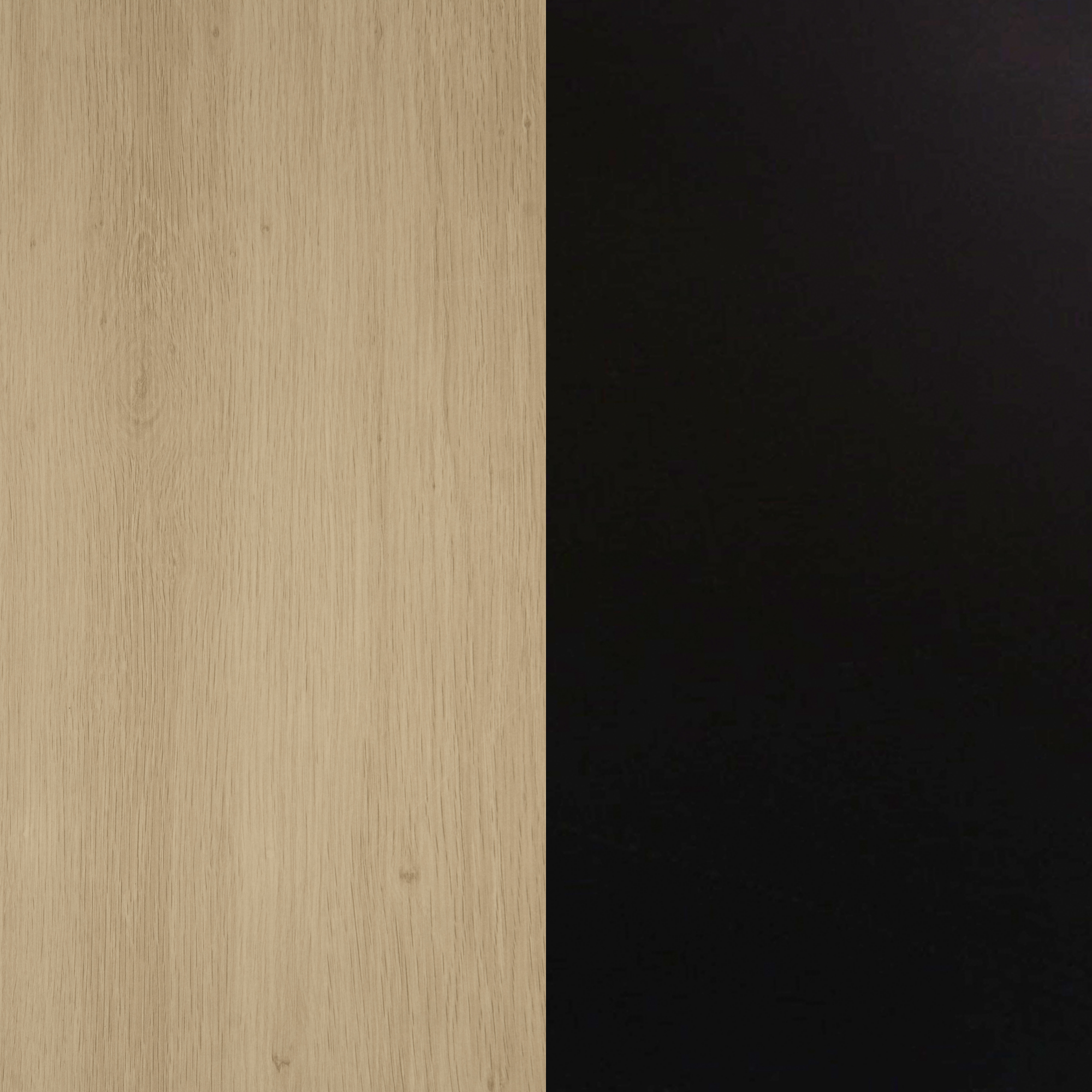 A split surface showing two contrasting textures: the left side is light wood with a natural grain pattern, and the right side is a smooth, solid black color.