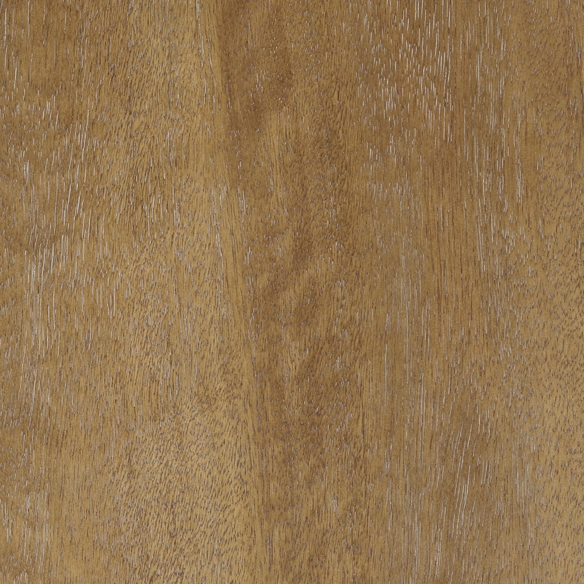 A close-up view of a wooden surface with a warm brown color and visible natural grain patterns, featuring subtle variations in texture and tone.