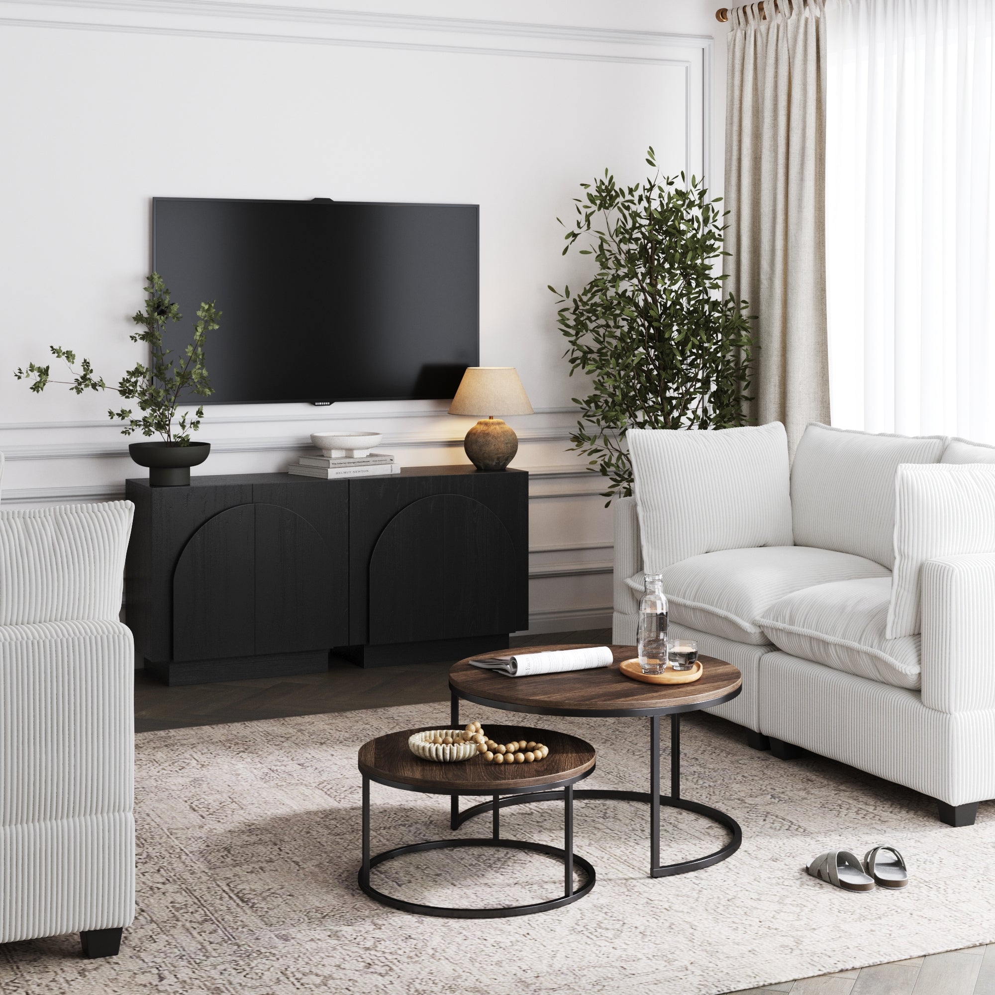 A living room with a tv on the wall.