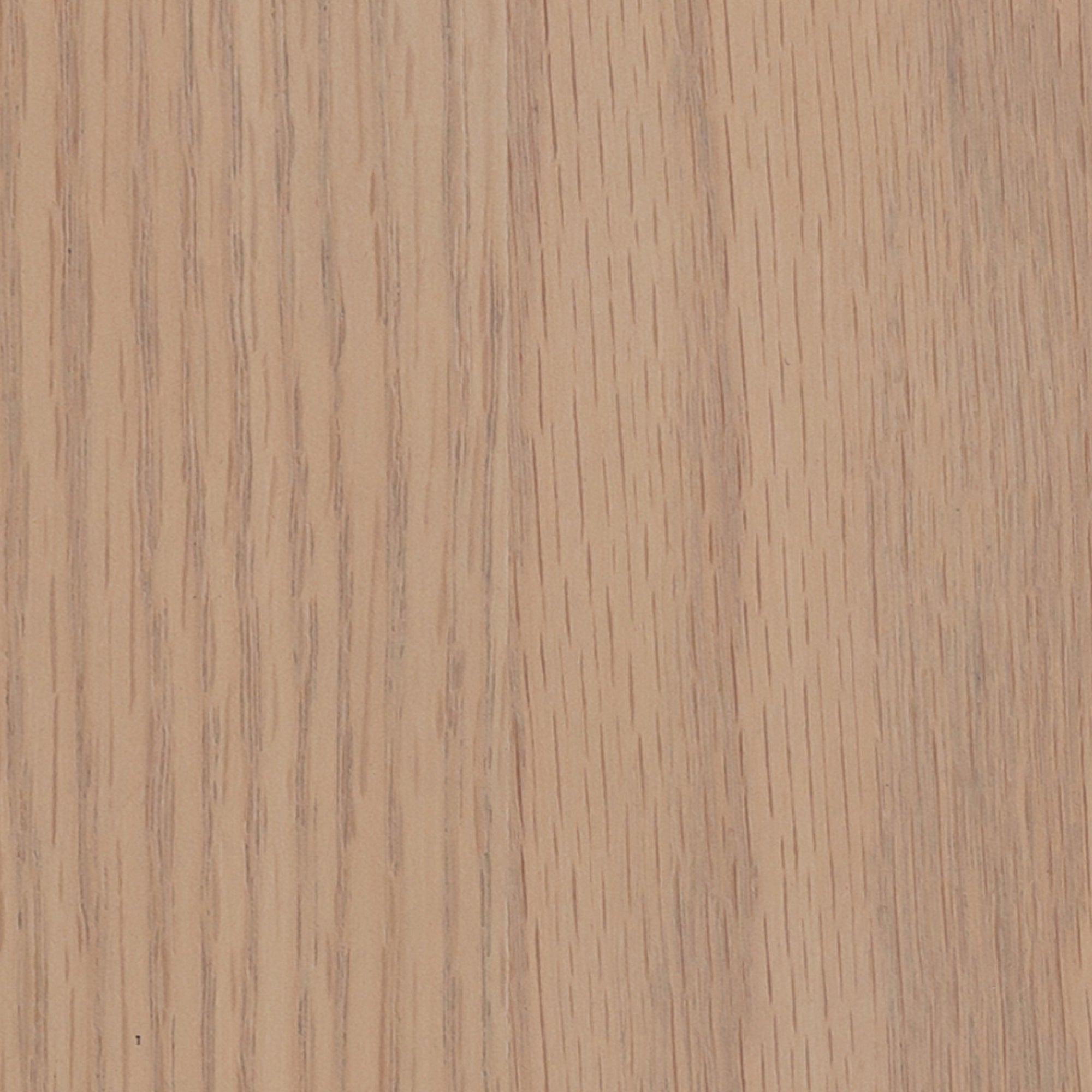 Close-up of a light brown wooden surface showing natural vertical grain patterns and subtle color variations. The texture appears smooth with fine, straight lines typical of finished wood.