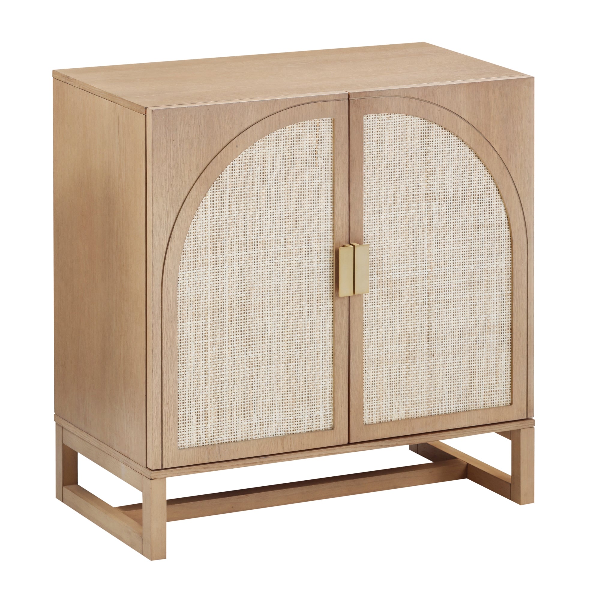 A light wood cabinet with two front doors featuring arched cane panels and a rectangular gold handle, standing on a simple open-frame wooden base.