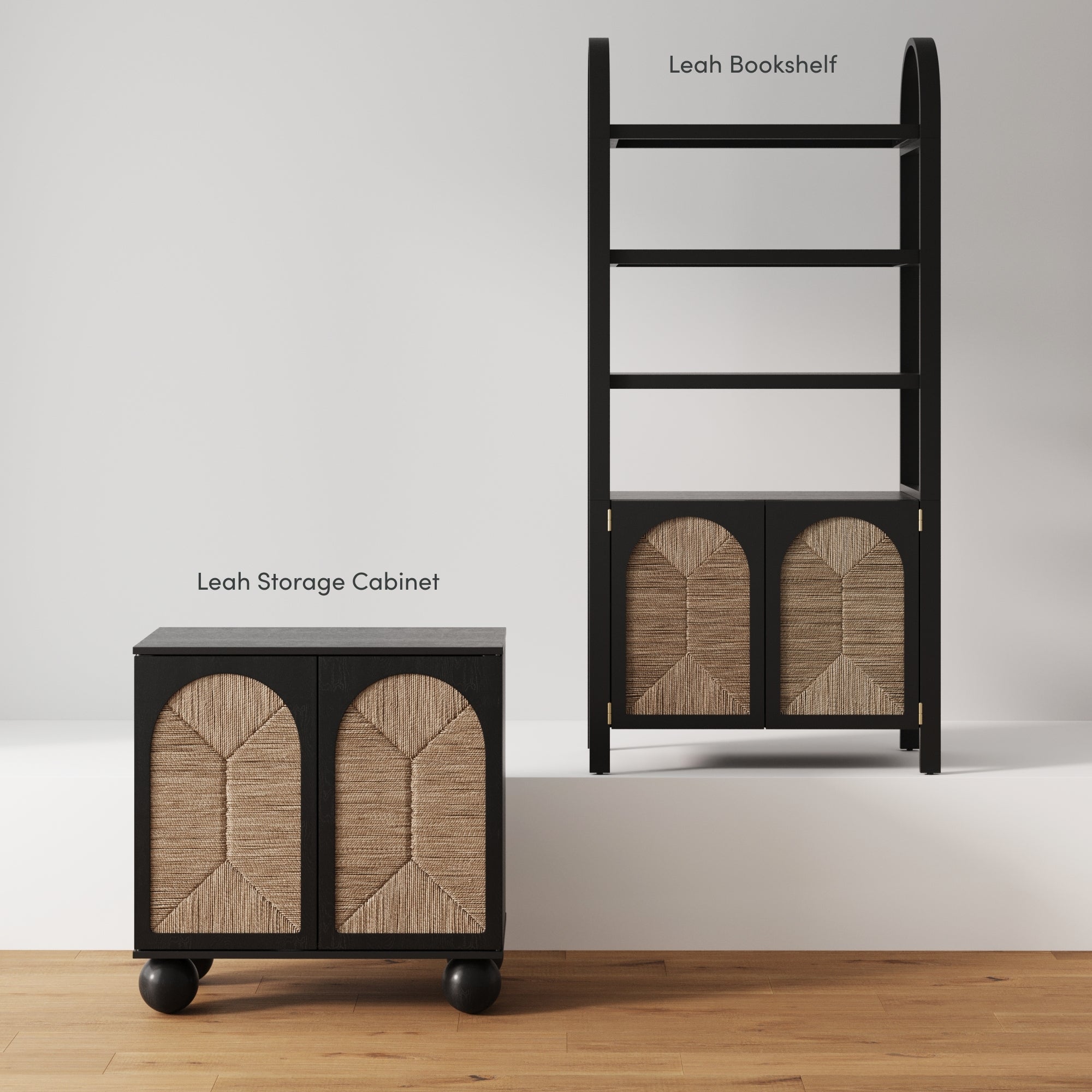 Two black furniture pieces on a wooden floor: a low cabinet with woven doors labeled Leah Storage Cabinet, and a matching tall bookshelf with woven doors at the bottom labeled Leah Bookshelf.