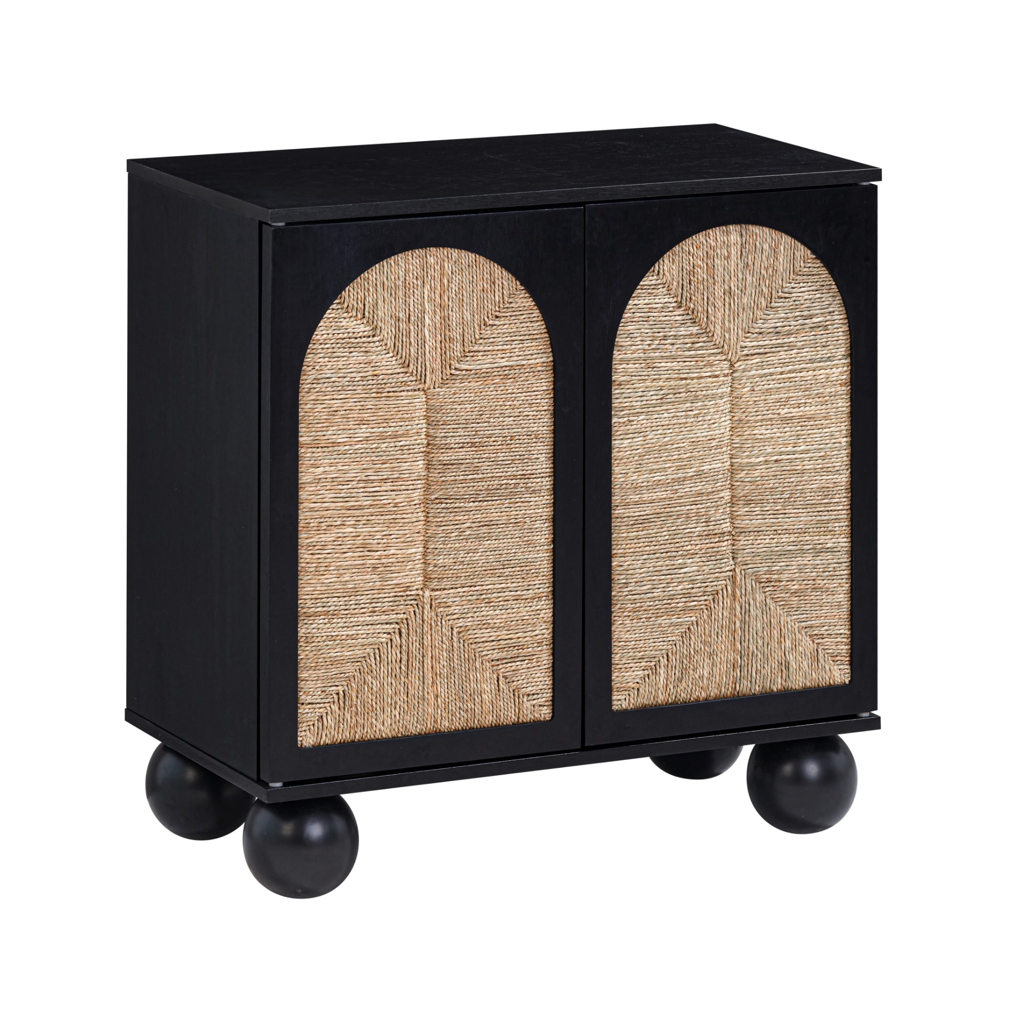 A small black cabinet with two doors featuring arched, woven rattan panels and four large, round ball-shaped legs.