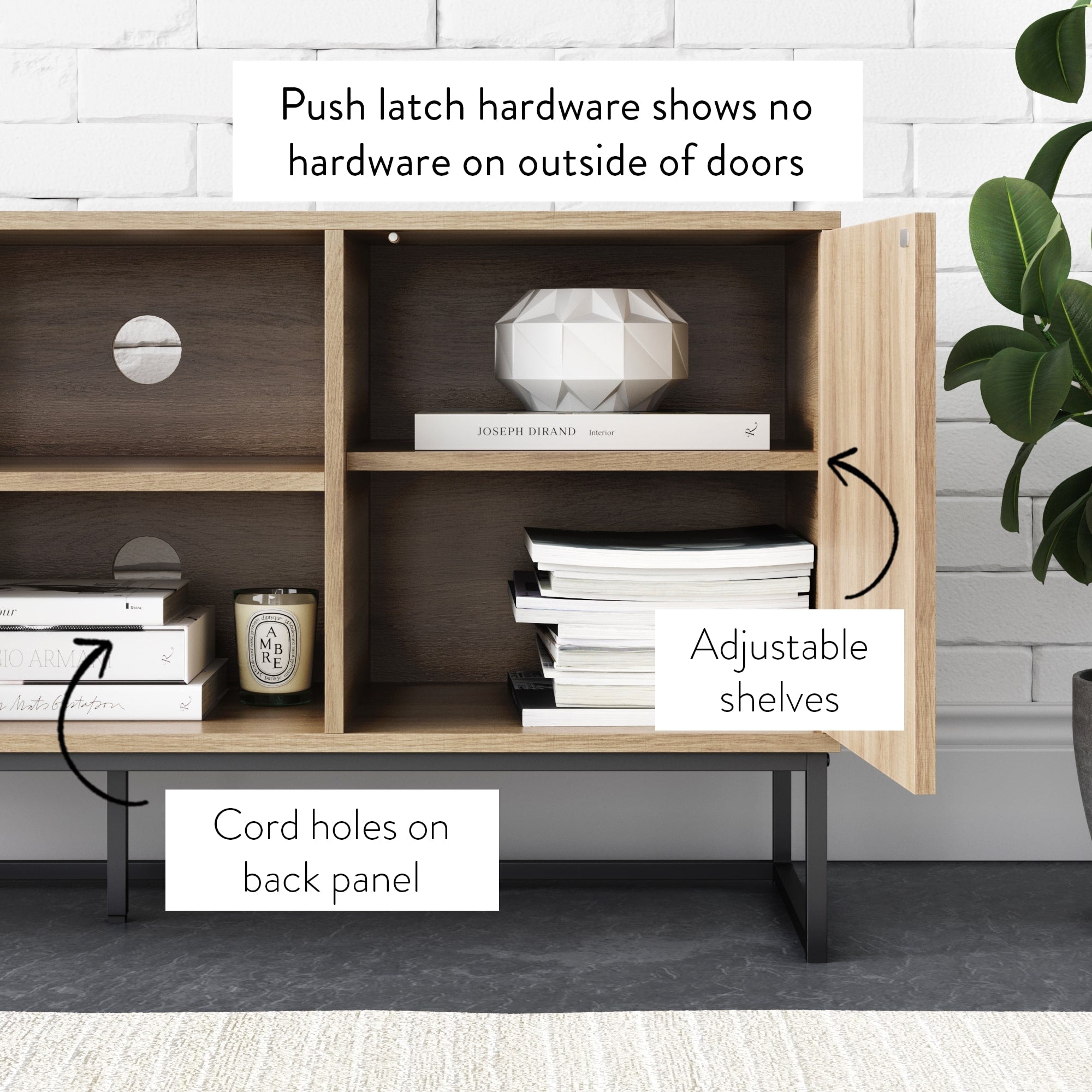 A wooden cabinet with open doors displays adjustable shelves, cord holes on the back panel, and a push latch system that leaves no hardware visible on the door fronts. Books and decor items are placed inside and on top.