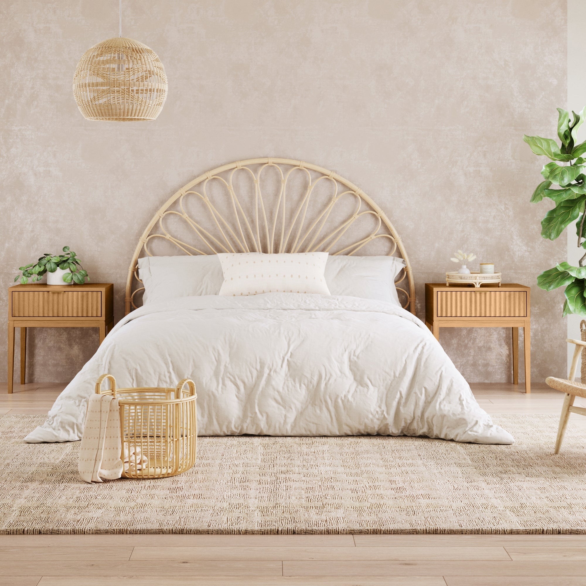 A bed with Nathan James Mid-Century Fluted Nightstands in Warm Pine (Set of 2), featuring fluted drawers, plus a basket and a plant on the side.