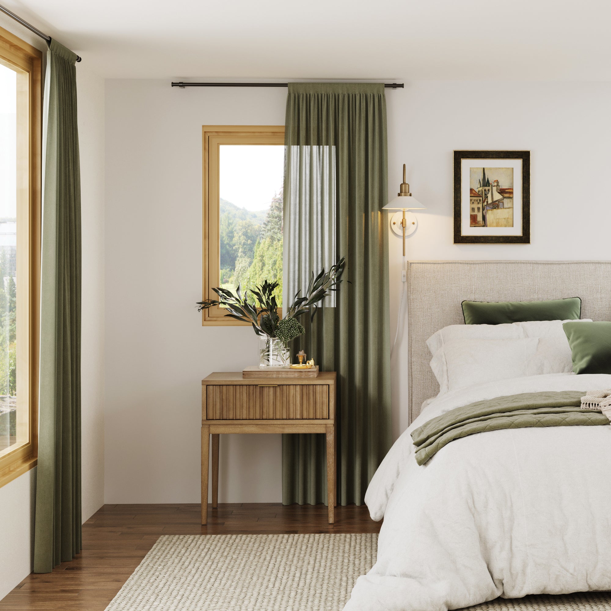 A cozy bedroom with a made bed, green and white bedding, a wooden nightstand with a vase and glassware, green curtains, a window with a view of trees, and a framed picture on the wall.