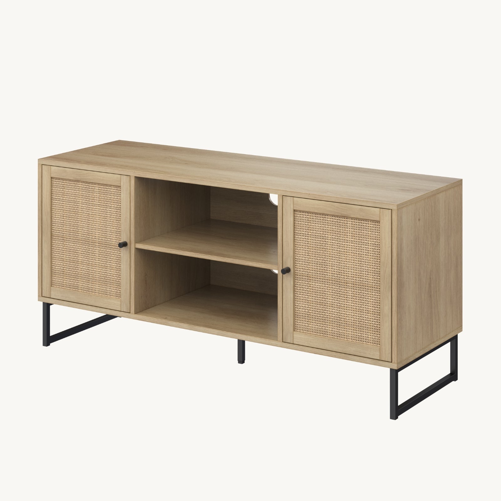A wooden TV stand with two rattan-front cabinet doors on each side, two open center shelves, and black metal legs, set against a plain light background.