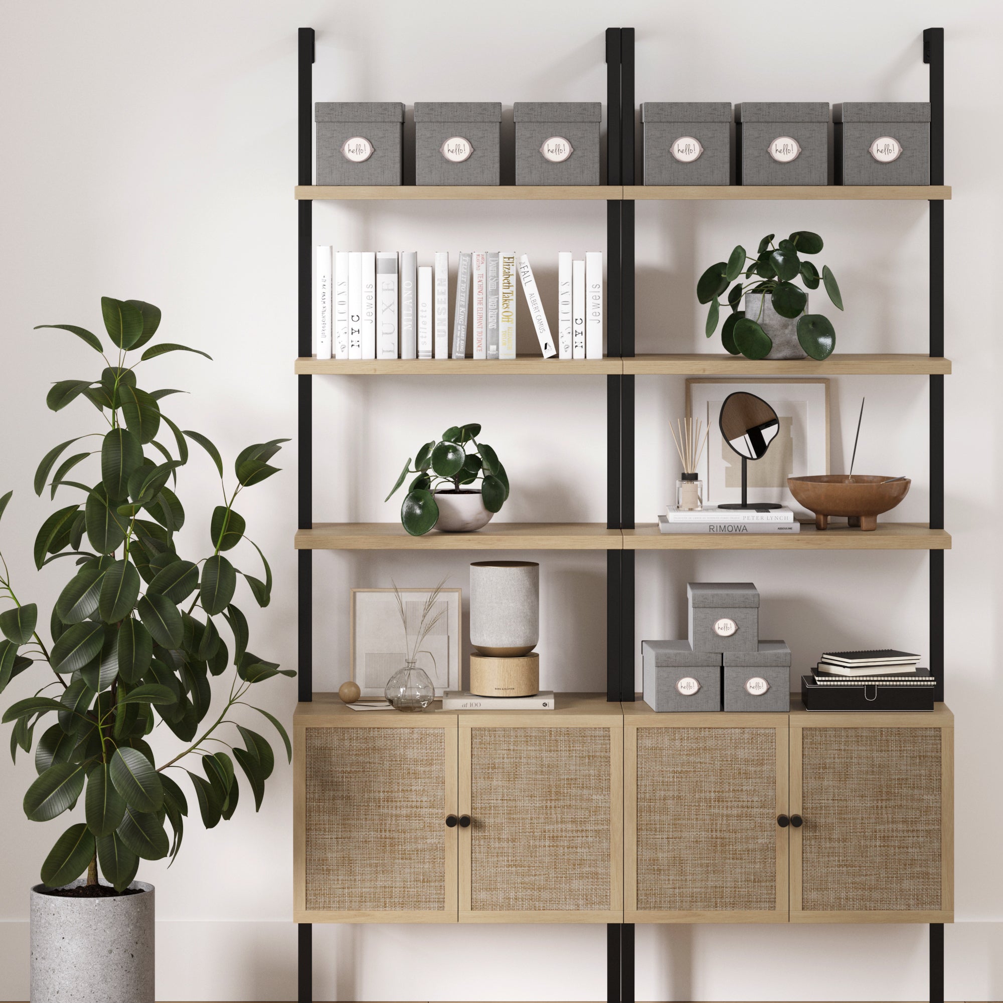 The Nathan James Rattan Ladder Wall Bookshelves with Doors in Light Oak (Set of 2) showcase books, gray storage boxes, potted plants, and décor against a white wall, with a tall leafy plant beside them for stylish, space-saving storage.