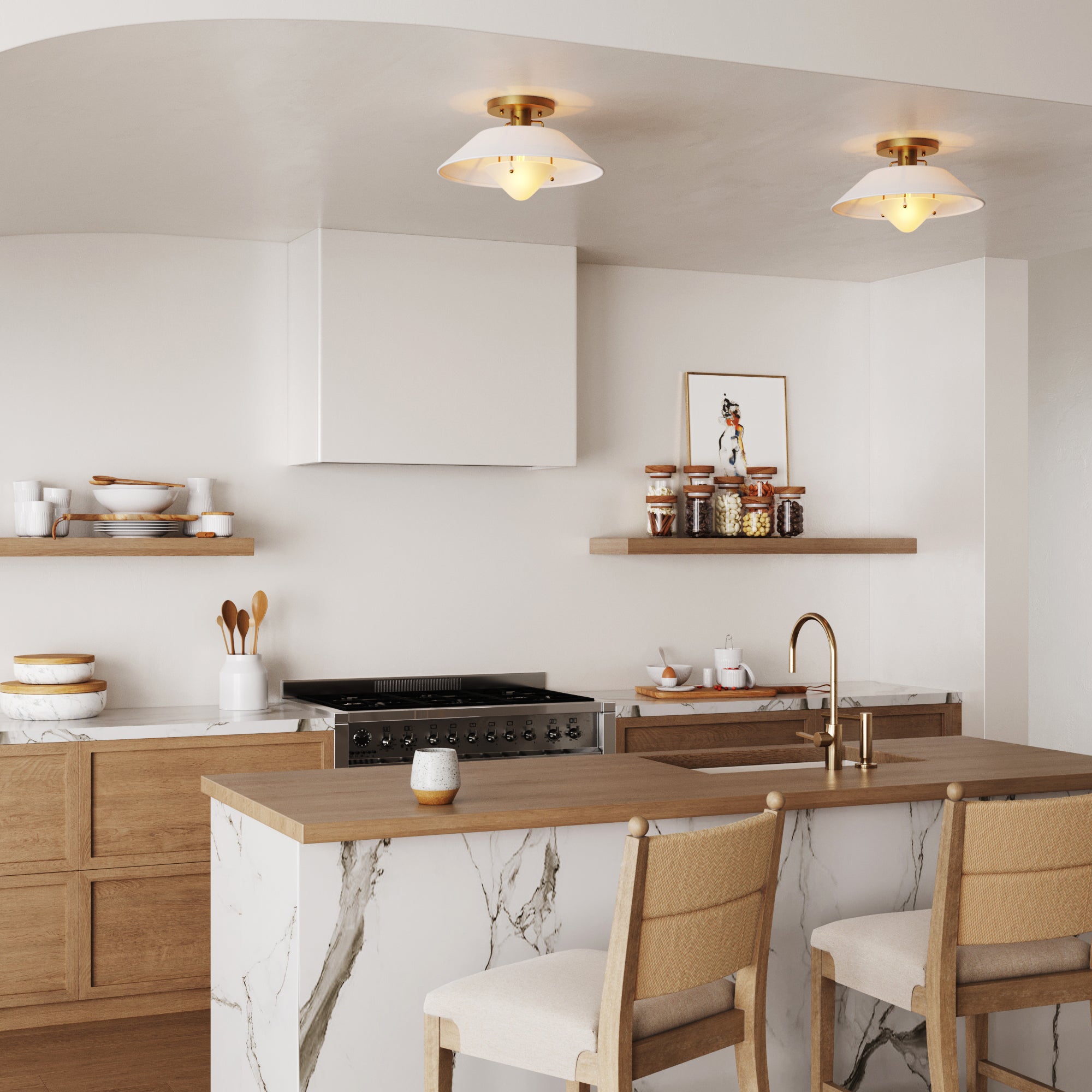 A modern kitchen with light wood cabinets, marble countertops, open shelves with jars and dishes, two upholstered chairs at a marble island, a gold faucet, and two elegant ceiling lights.
