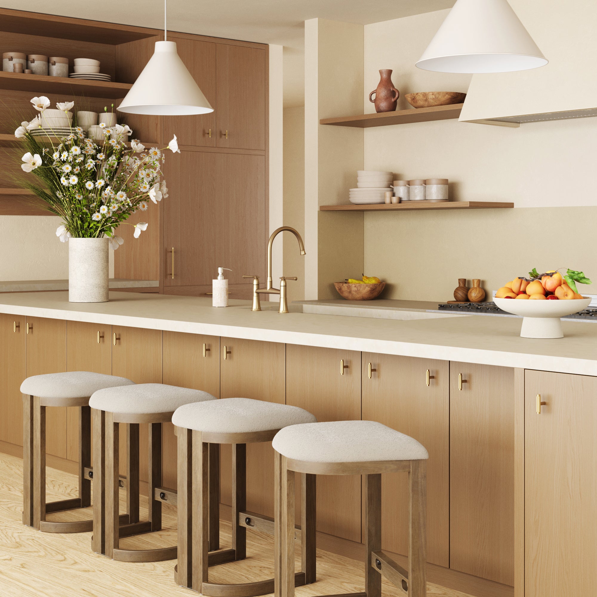 A modern kitchen features light wood cabinets, neutral countertops, a Nathan James Barrel Wooden Backless Bar Stool Light Brown Set of 4, pendant lights, open shelves with dishes, a flower vase, and a fruit bowl on the island.