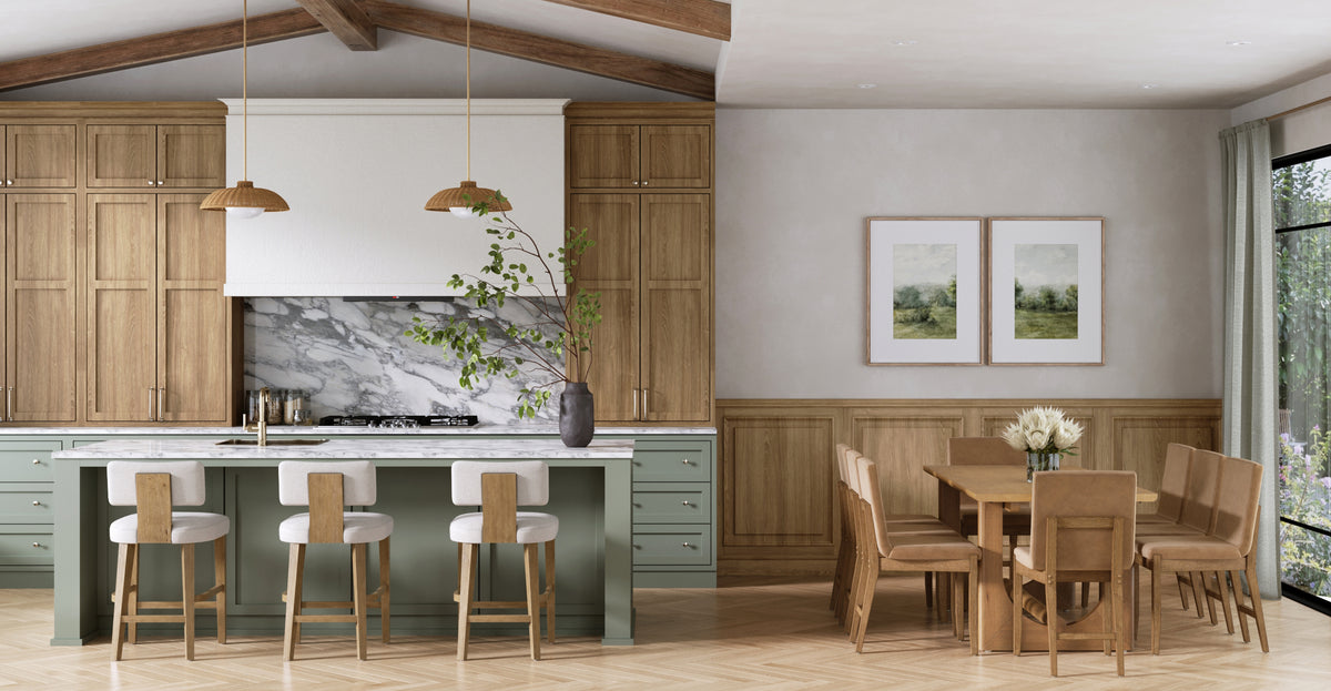 Modern kitchen with a light green island, wood cabinetry, marble backsplash, and an adjacent dining area with a wooden table and chairs.