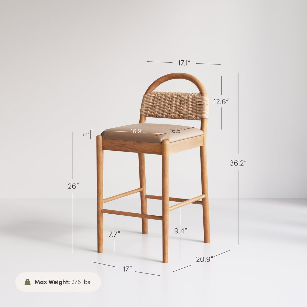 Nathan James Modern Wood Seagrass & Faux Suede Counter Stool with a woven backrest and 275-pound weight limit.