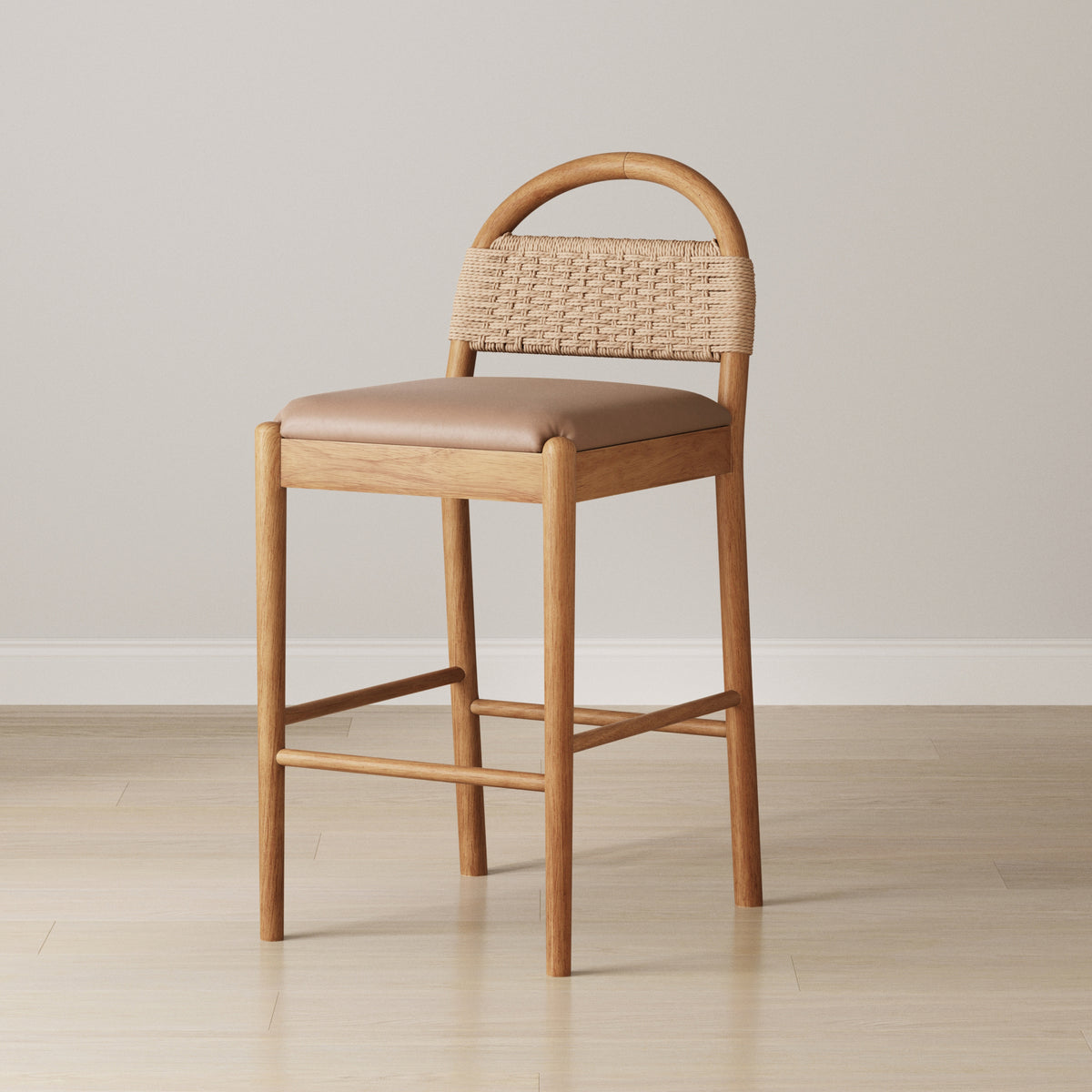 Modern Seagrass & Faux Suede Counter Stool Warm Pine with a solid rubberwood frame, woven backrest, and cushioned seat.