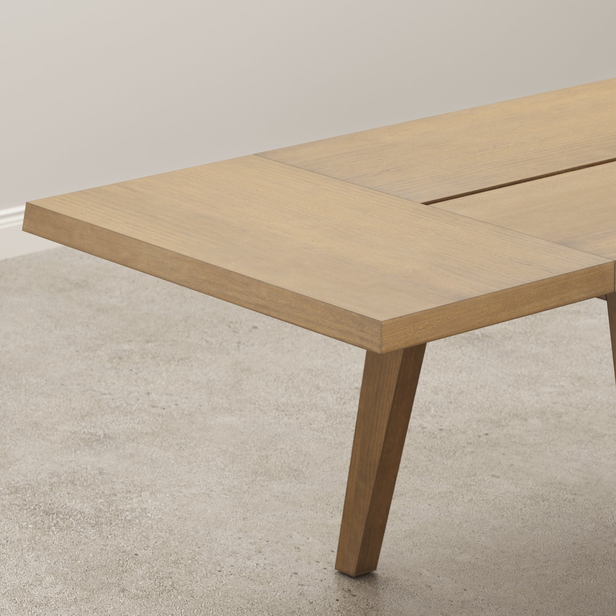 A rectangular wooden dining table with a smooth surface and four straight legs, viewed from the front. The table has a natural wood finish and clean, minimalist design.