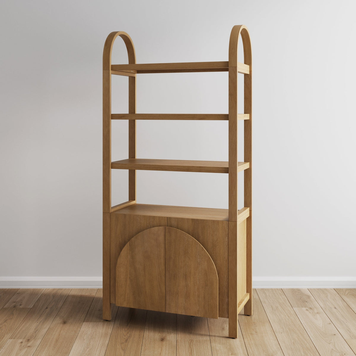 A wooden shelving unit with three open shelves and an arched double-door cabinet at the bottom, standing on a wooden floor against a plain white wall.