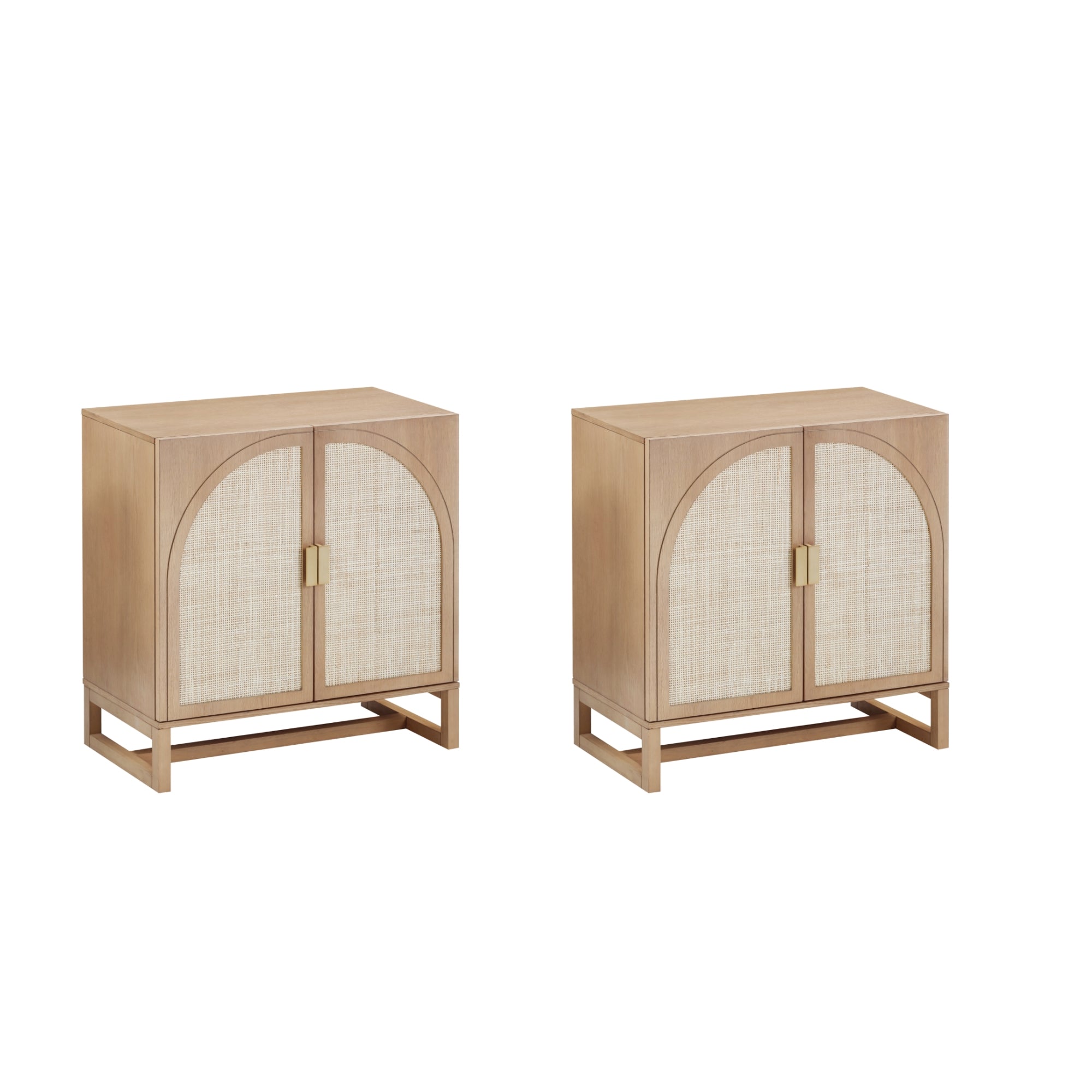 Two light wood cabinets with rectangular frames, arched panel doors featuring a woven texture, and gold rectangular handles, standing on open block-style bases.